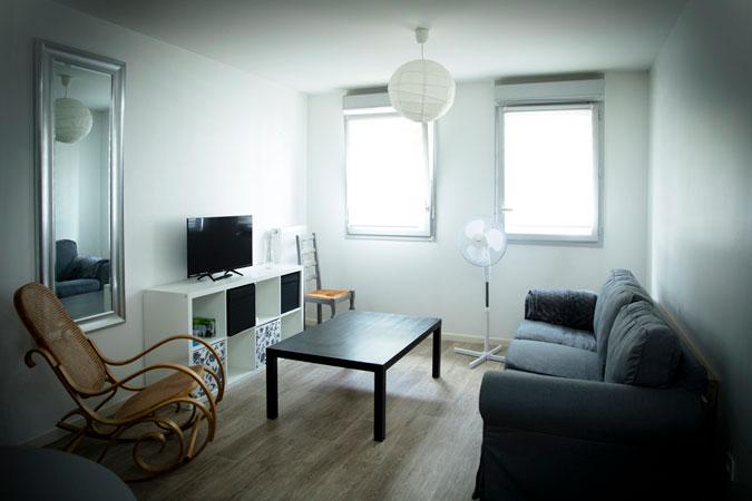 Le salon d'un logement tremplin lillois Le salon d'un logement tremplin lillois